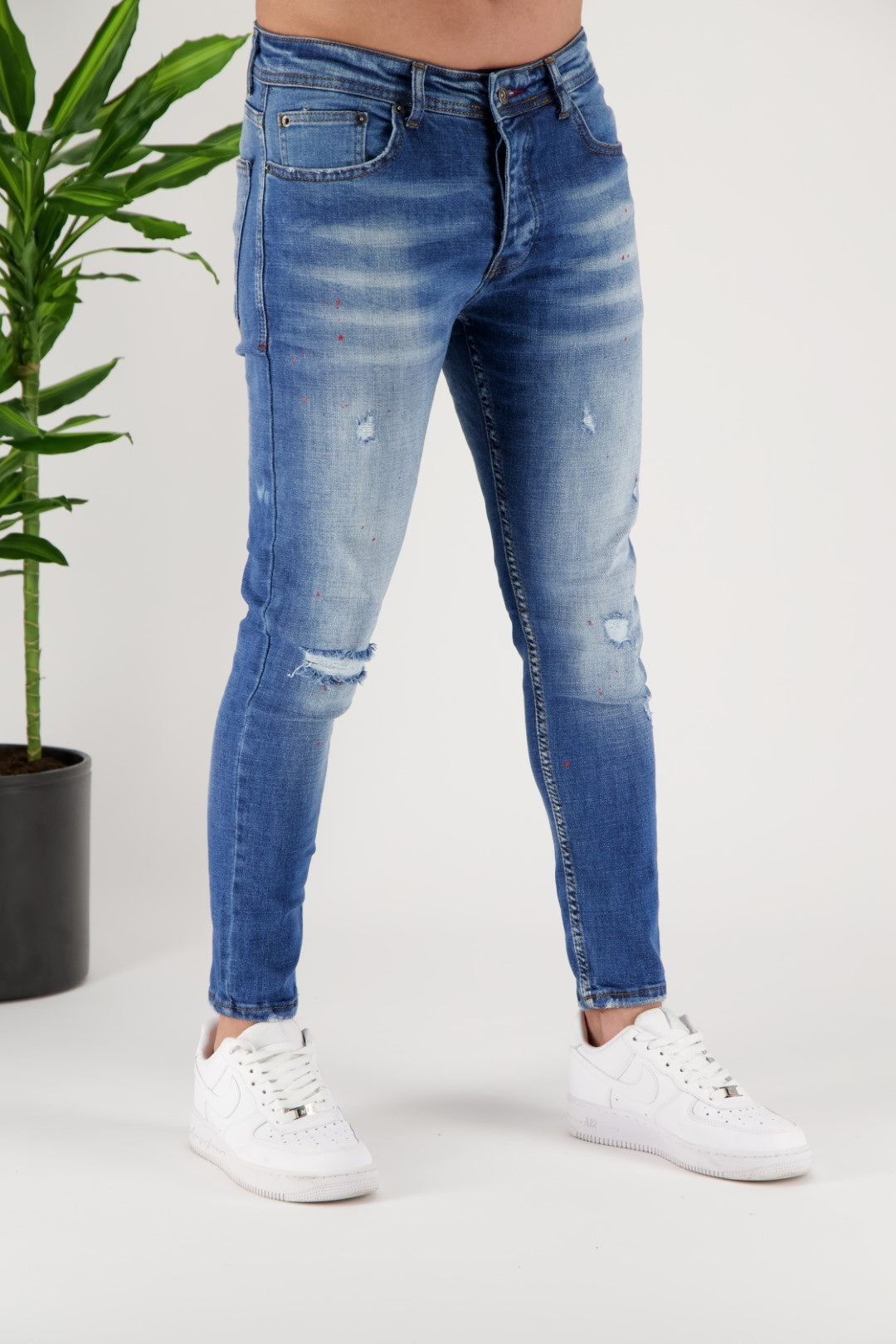 Skinny Jeans spritzten hellblau
