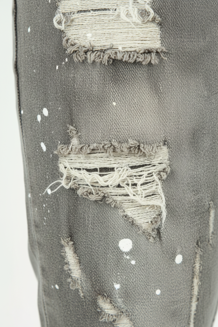 Jean éclaboussé en denim gris
