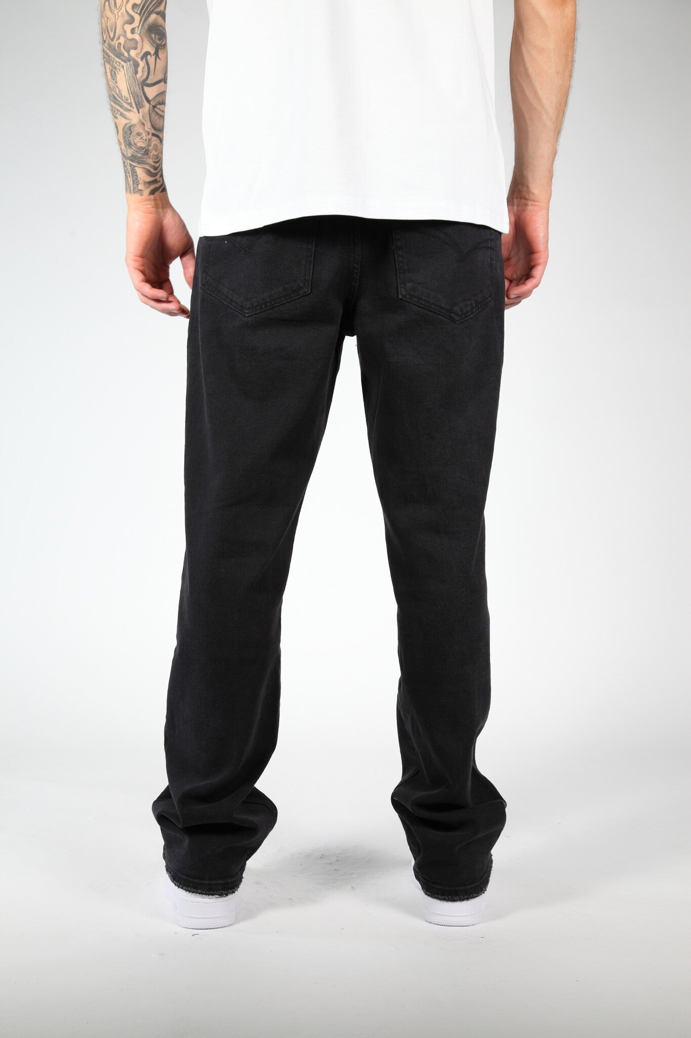 The ripped jeans black