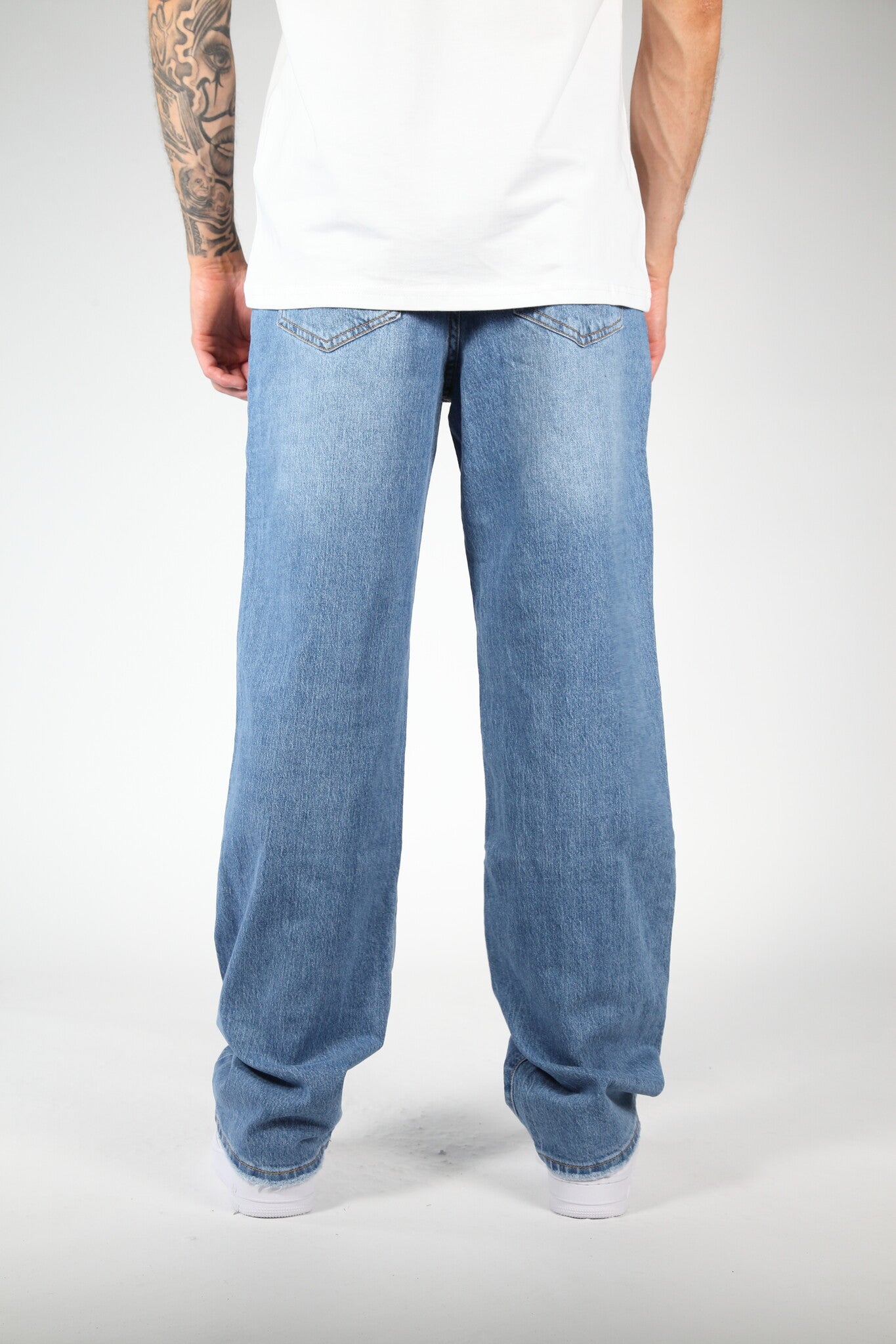 The ripped jeans black
