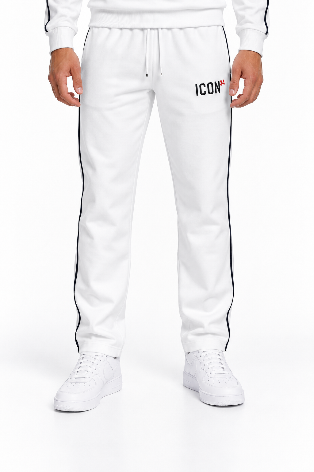 Foto frontal del conjunto de pista ICON Monza blanco para hombre con logo ICON34 y detalles en negro